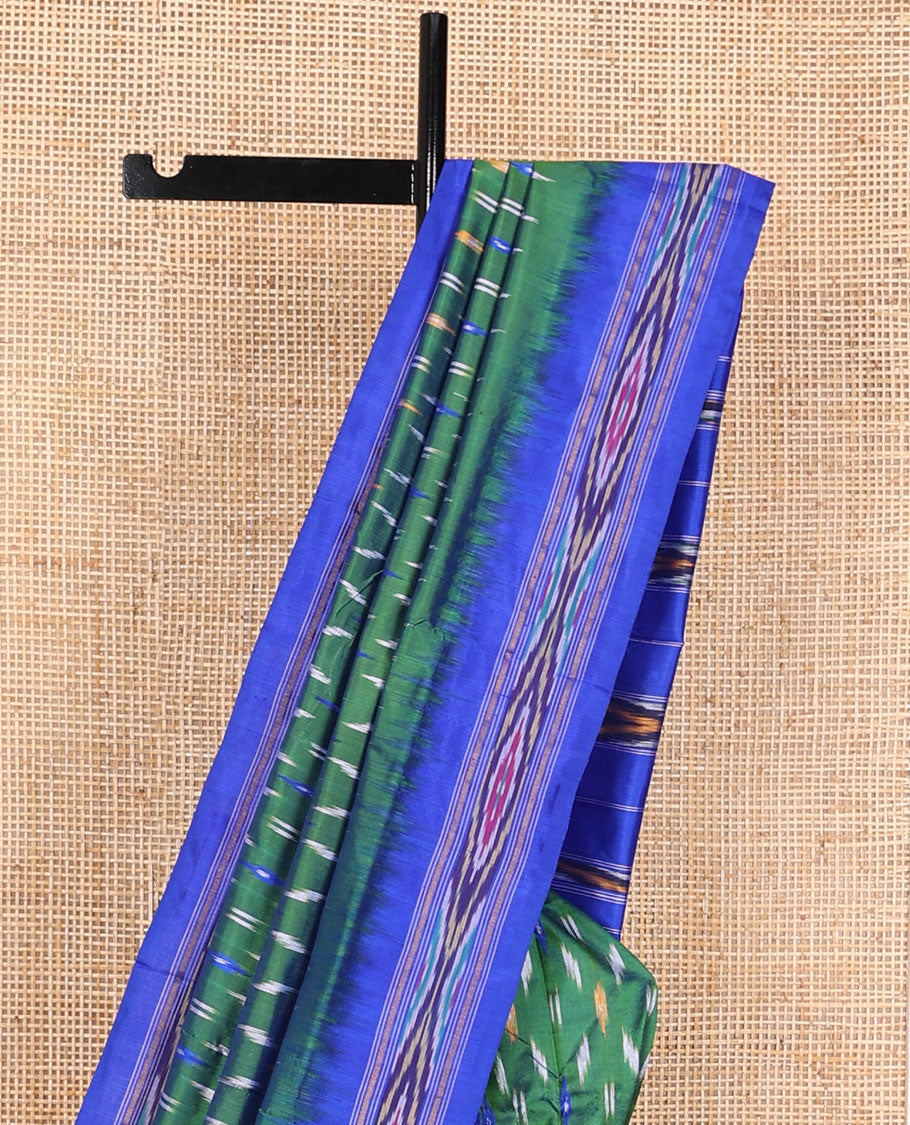 Green buttas ikkat saree, contrast ikkat border & pallu of ikkat weave & stripes