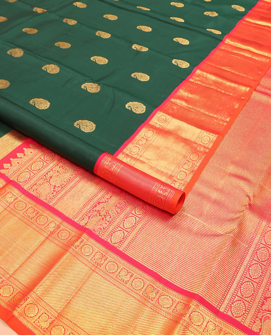 Green manga buttas Kanchipuram silk saree, contrast border of kathir, banaras, mayil, and chakram designs, and intricate pallu