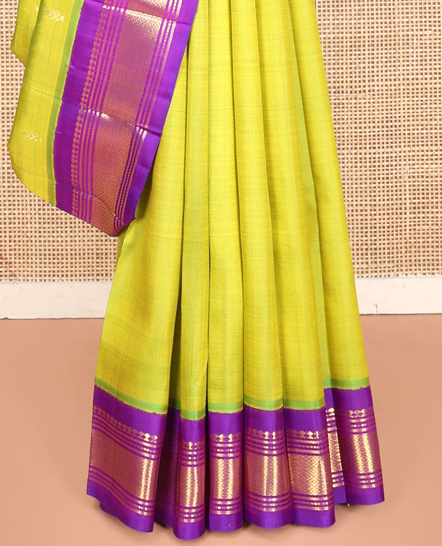 Green Kanchipuram Silk Saree, Detailed with Zari Buttas, Contrast Border of Paneer Sombu, Banaras, Muthu,and Mayil Kann, Zari Design Pallu, and No Blouse