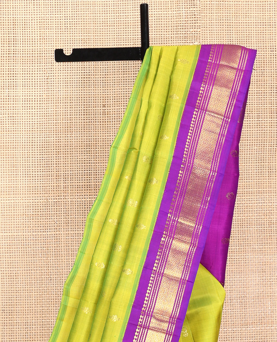 Green Kanchipuram Silk Saree, Detailed with Zari Buttas, Contrast Border of Paneer Sombu, Banaras, Muthu,and Mayil Kann, Zari Design Pallu, and No Blouse