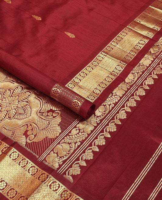 Maroon buttas kancheepuram silk saree with self zari design border & floral design pallu