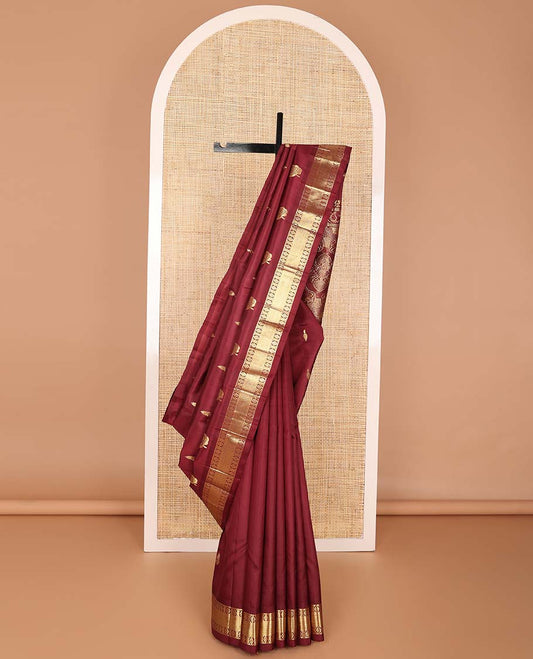 Maroon buttas kancheepuram silk saree with self zari design border & floral design pallu