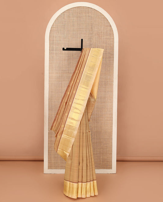 Sandal zari buttas Kanchipuram silk saree, contrast one-sided border of panner sombu, banaras, and mayil kann, and zari woven pallu