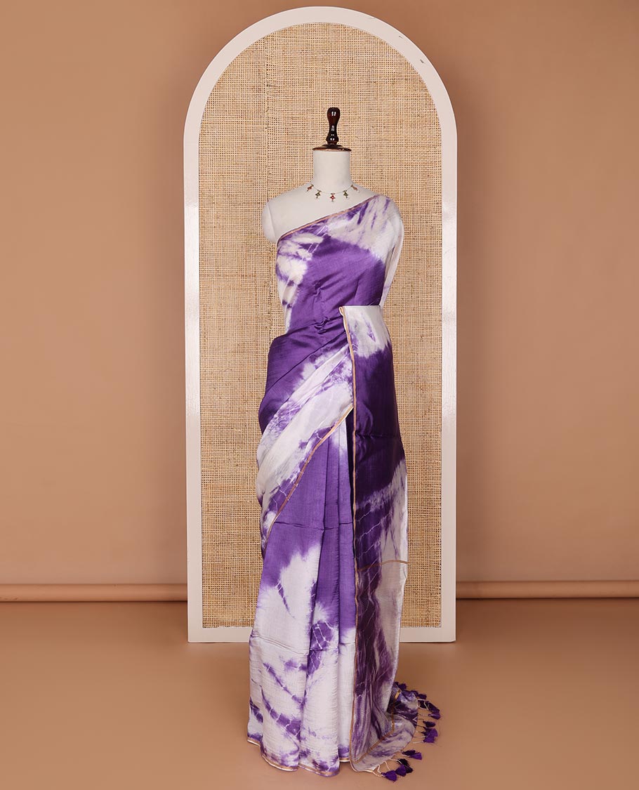 Borderless violet and white Shibori-style tie-dye printed saree, shibori printed pallu with violet tassels