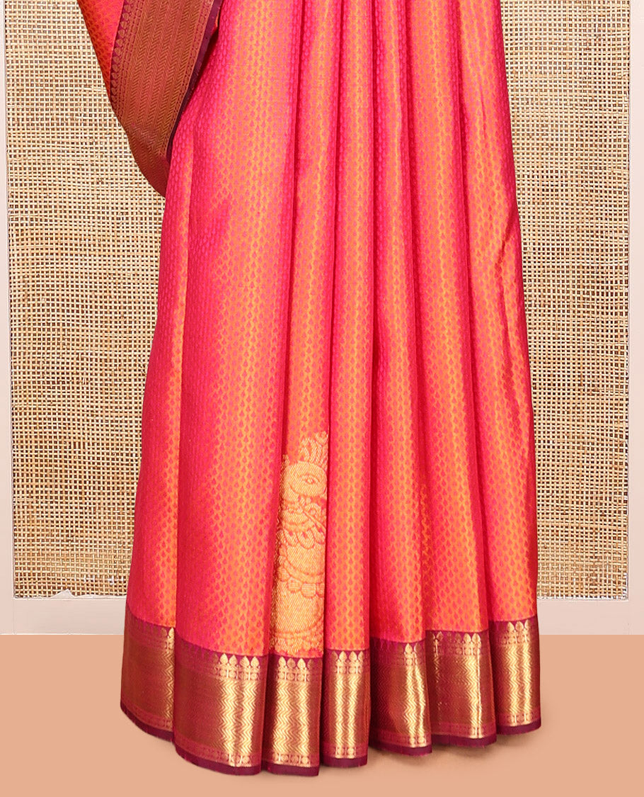 Orange Embossed Parambara Silk Saree, Adorned with Mayil Buttas, a Contrast Border of Thilakam Mokku, Poun, and Vanki Designs, Grand Pallu, and Contrast Blouse