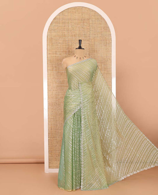 Green diagonal striped foli printed shimmer chiffon saree, scallop jarkan stone work border, self-pallu, and plain blouse