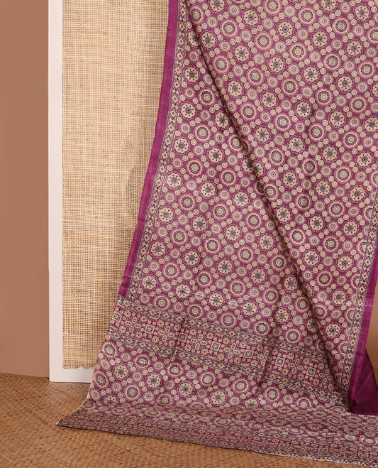 Purple Ajrakh-style printed silk saree, self-border, and pallu features Ajrakh-style print