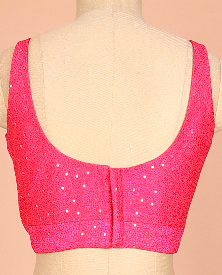 Pink embossed thread embroidery & sequins work sleeveless readymade blouse with deep-V front neck & round back neck