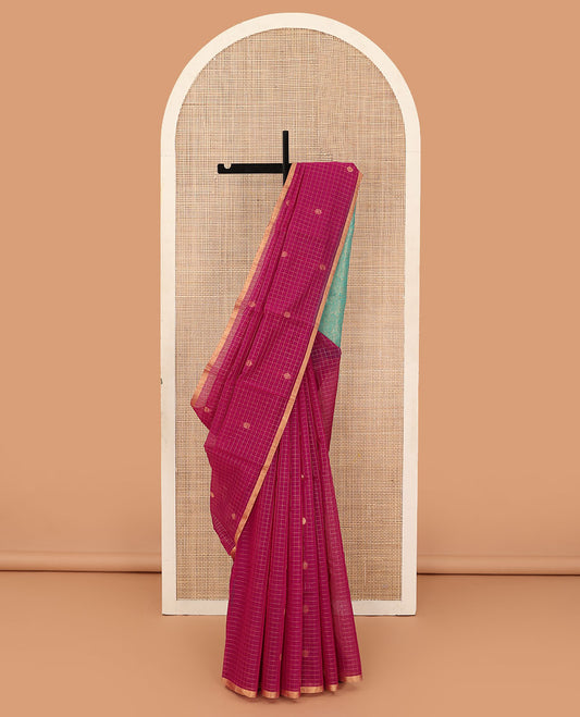 Red zari buttas and checked silk cotton saree, zari piping border, and contrast leaf patterned pallu