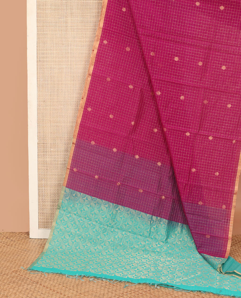 Red zari buttas and checked silk cotton saree, zari piping border, and contrast leaf patterned pallu
