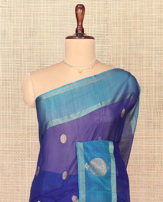 Blue Silk Cotton Saree, Artfully Woven with Peacock and Rudraksham Motifs On Its Body, Complemented by Contrast Zari Motifs Woven Border, Geometric Zari Patterned Pallu and Paired with a Contrast Blouse