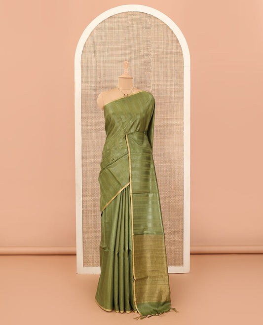 Borderless green sparsely striped tussar silk saree with plain pallu
