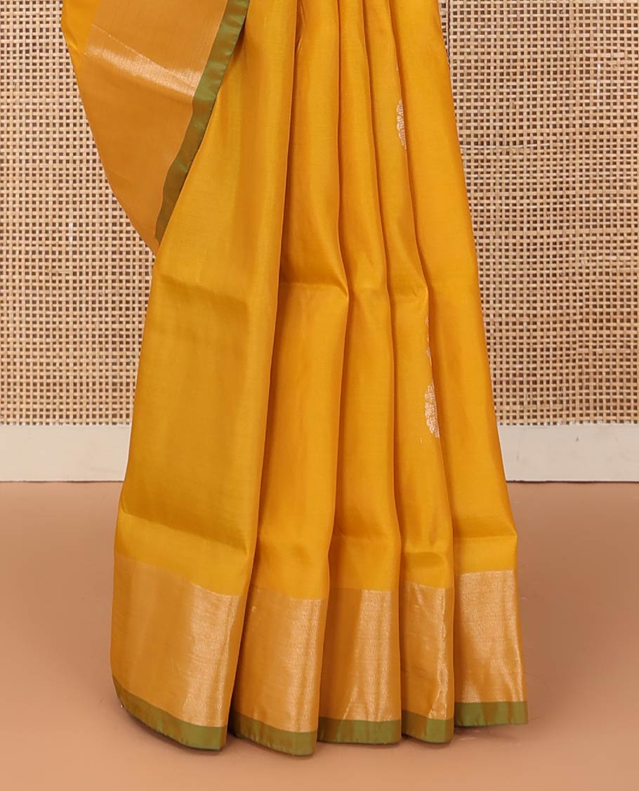 Yellow floral zari buttas Uppada saree, contrast bavanji border, and ogee patterned pallu