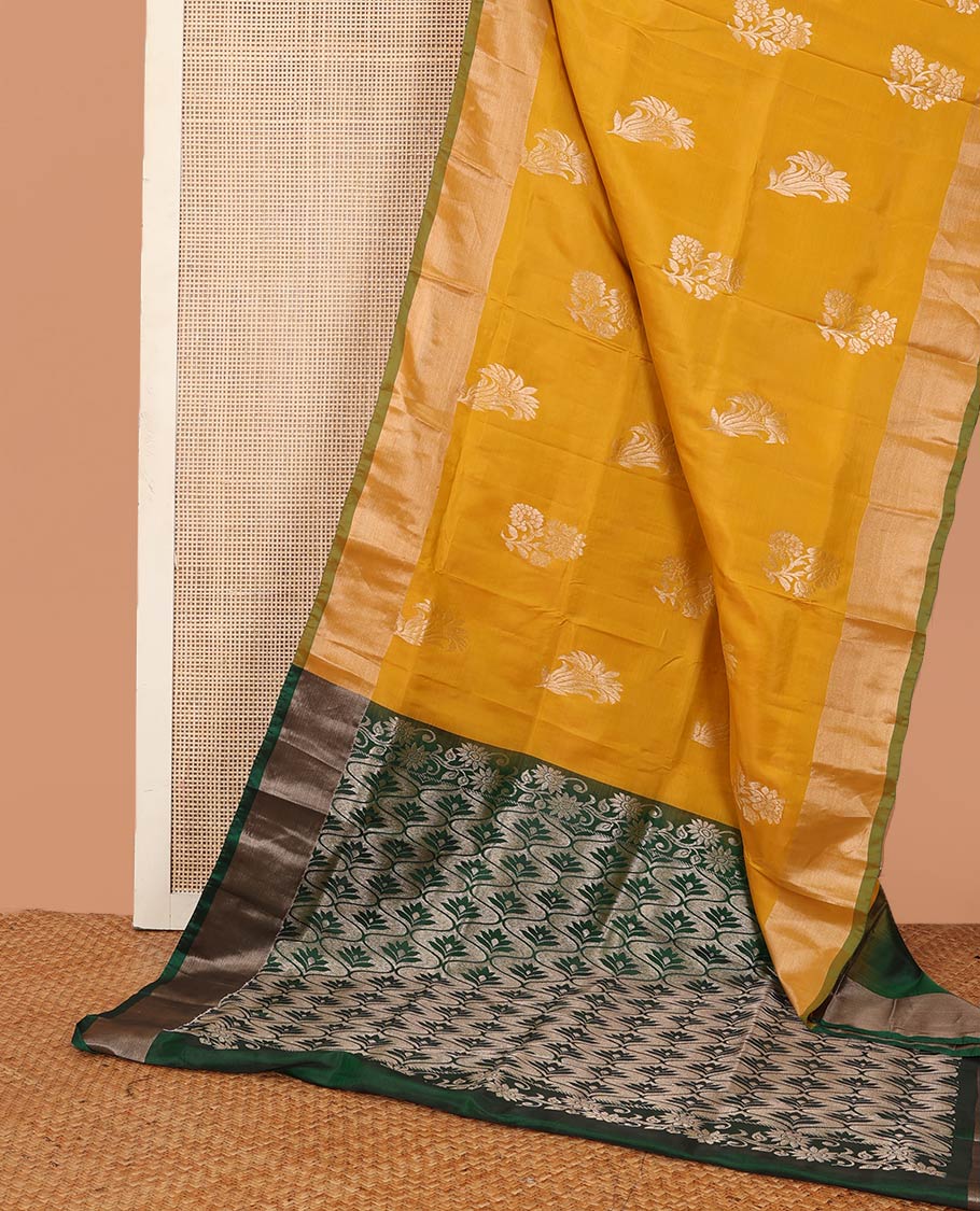 Yellow floral zari buttas Uppada saree, contrast bavanji border, and ogee patterned pallu