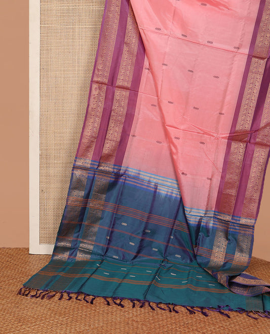 Pink buttas banana pith saree, contrast rettai pettu traditional zari border, and pallu of stripes, and buttas