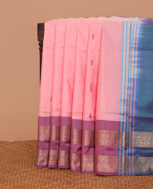 Pink buttas banana pith saree, contrast rettai pettu traditional zari border, and pallu of stripes, and buttas