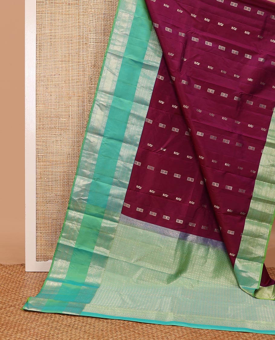 Purple meena buttas silksaree, contrast rettai pettu border of thilakam mokku,banaras,muthu & kodi visiry & zari-rich gleaming motifs pallu