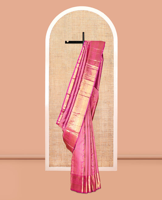 Pink Kanchipuram Wedding Silk Saree, Ornamented with Jacquard Design, a Traditional Zari Border, Grand Pallu, and a Matching Blouse
