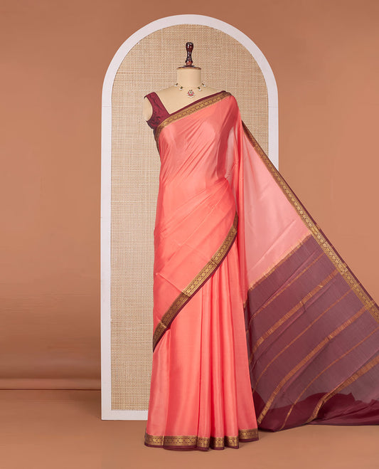 Peach Plain Mysore Silk Saree, Complemented by a Contrast Traditional Zari Design Border, Zari Striped Pallu, and Paired with a Contrast Blouse