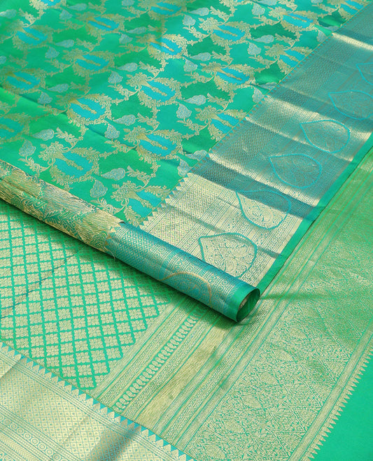 Green floral jaal design kancheepuram silk saree with contrast border of thilakam mokku, banaras, muthu, mayil kann, kathir design & zari design pallu