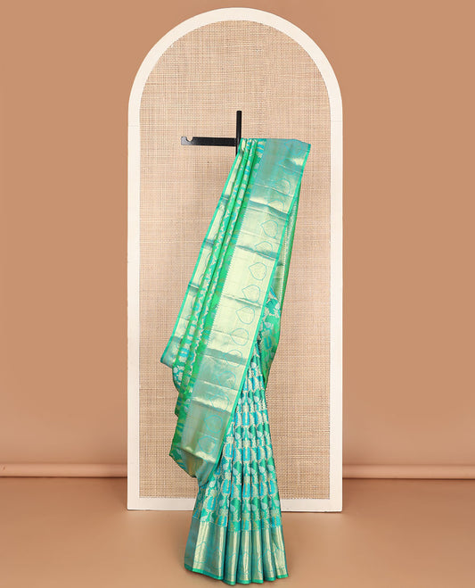 Green floral jaal design kancheepuram silk saree with contrast border of thilakam mokku, banaras, muthu, mayil kann, kathir design & zari design pallu