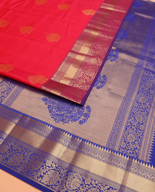 Red Vasundhara Lite Silk Mix Saree Decked Up with Zari Buttas, Complemented with a Contrast Border of Thazampoo Rekku, Banaras, Kathir, Kuyil Kann, and Kodi Visiry Designs, a Pallu Elevated with Floral Designs, and a Contrast Blouse