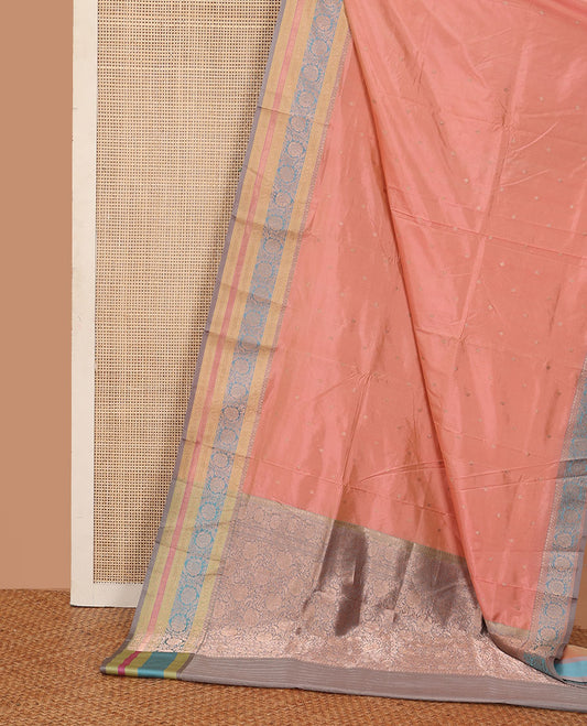 Peach zari buttas katan silk saree, contrast traditional border of floral creeper design, and floral jaal pallu