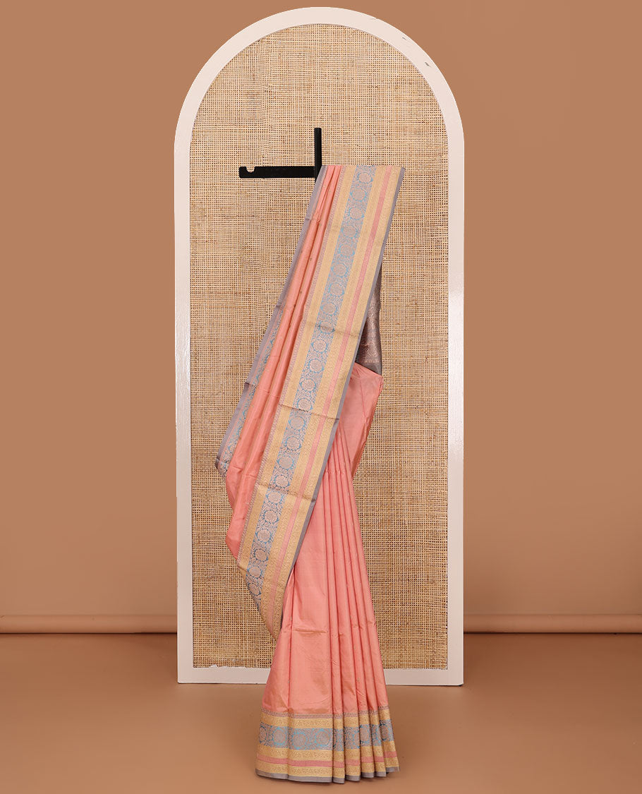 Peach zari buttas katan silk saree, contrast traditional border of floral creeper design, and floral jaal pallu