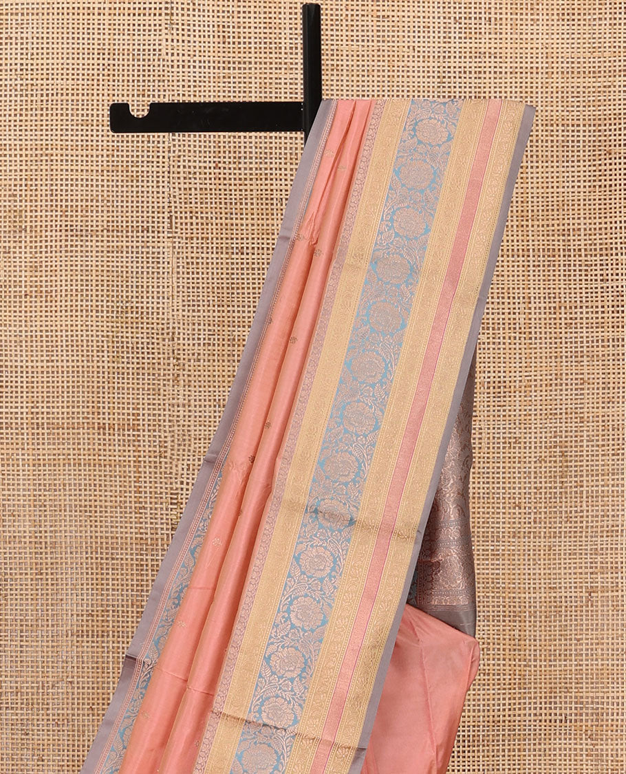 Peach zari buttas katan silk saree, contrast traditional border of floral creeper design, and floral jaal pallu