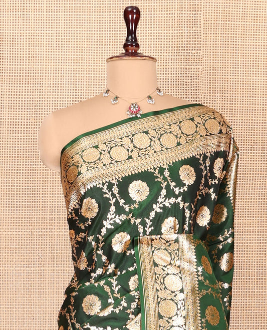 Green Banarasi Nylon Saree, Gleamed Up with Floral Jaal Jacquard, Highlighted by Traditional Zari Border, Intricate Pallu, and a Matching Blouse