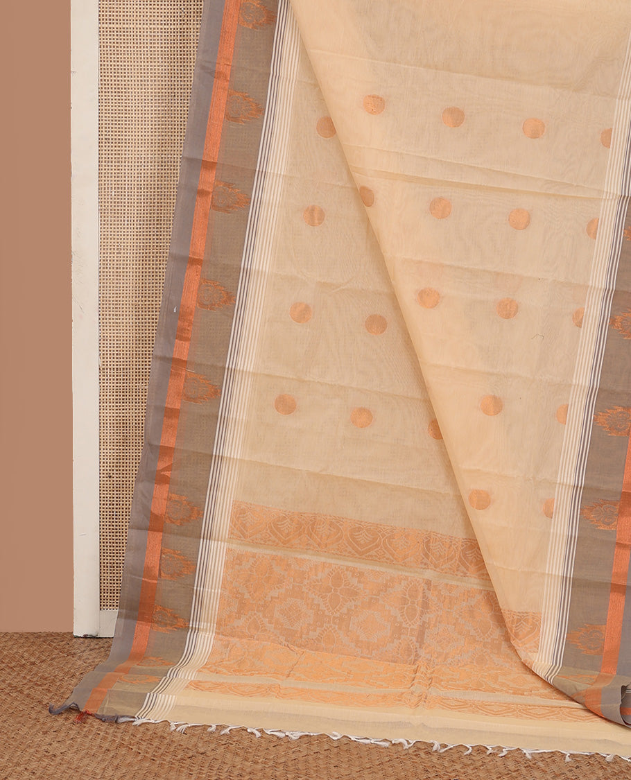 Cream polka dots buttas kanchi cotton saree, contrast zari motifs border, and pallu of jaal designs
