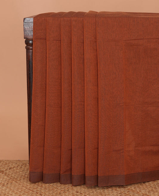 Brown sparesly striped Mangalagiri Cotton saree, plain border, plain pallu, and contrast Pichwai cow printed blouse