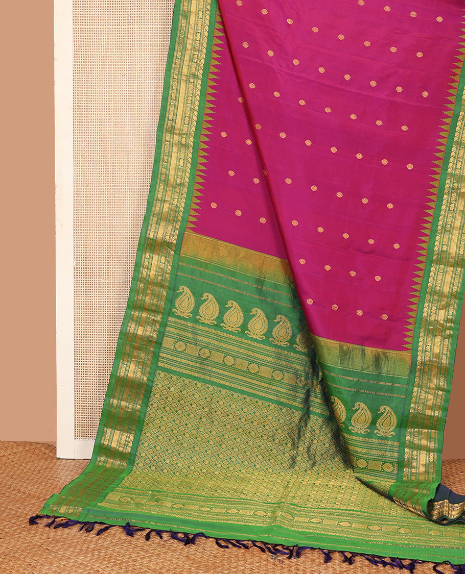 Pink chakram buttas gadwal silk saree, contrast thazampoo rekku border of manga mokku, star kamalam, and vanki designs