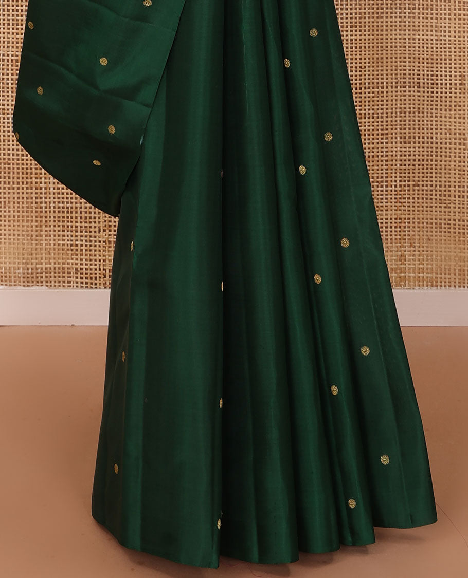 Borderless green zari buttas Kanchipuram silk saree, self-pallu of thilakam mokku, banaras, chakram, and jaal designs