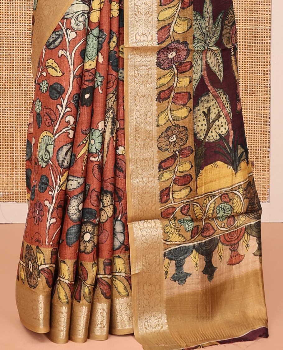 Brown Kalamkari Saree, Elevated with Floral Print, Complemented by Contrast Zari Border, Pallu of Lord Krishna Motifs, and a Contrast Blouse