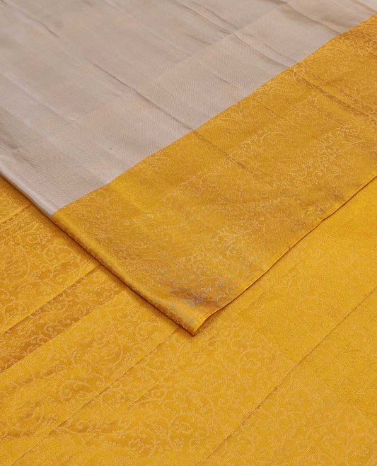 Grey buttas soft silk saree, contrast floral jaal border, and pallu of floral jaal designs