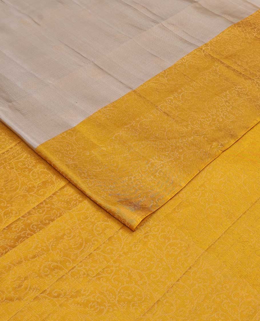 Grey buttas soft silk saree, contrast floral jaal border, and pallu of floral jaal designs