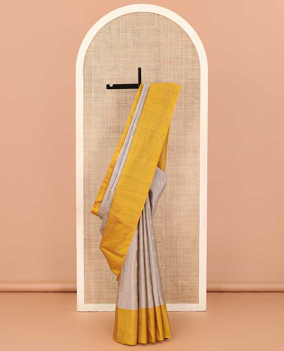 Grey buttas soft silk saree, contrast floral jaal border, and pallu of floral jaal designs