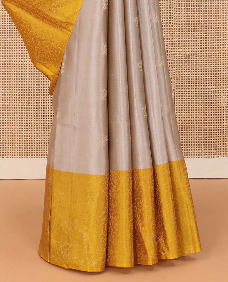 Grey buttas soft silk saree, contrast floral jaal border, and pallu of floral jaal designs