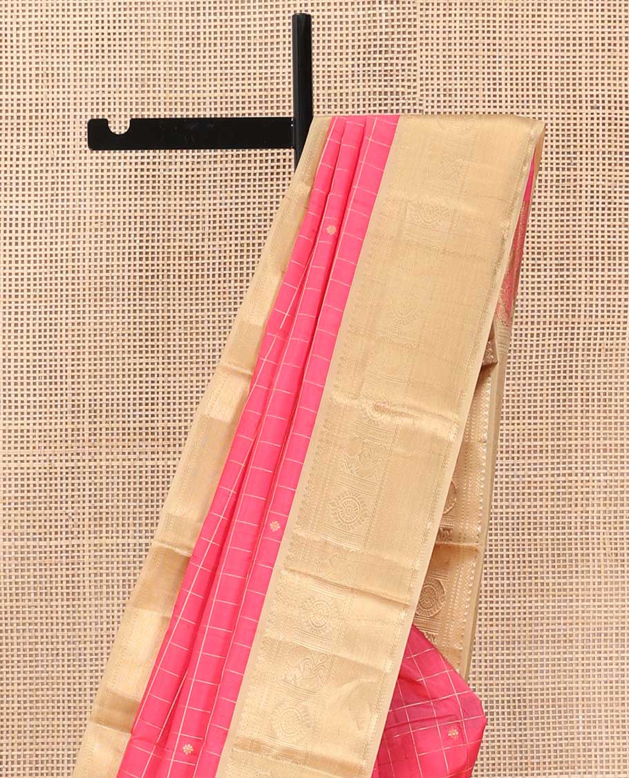 Red buttas enclosed checked silk saree, contrast border of thilakam mokku, kathir, and mayil chakram, and intricate pallu