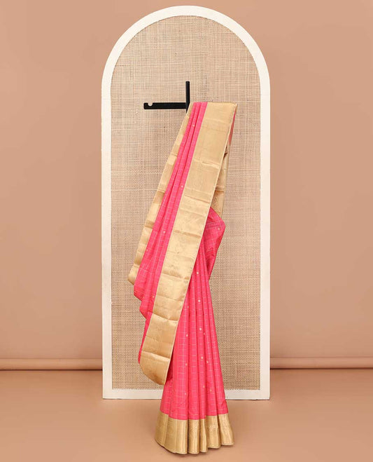 Red buttas enclosed checked silk saree, contrast border of thilakam mokku, kathir, and mayil chakram, and intricate pallu