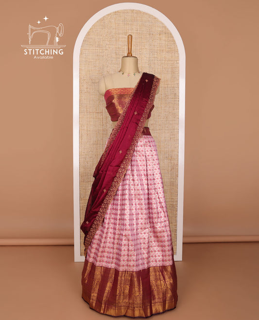 Light pink geometric design banaras half saree with contrast zari design border, floral design blouse & floral embroidery, scallop border dhavani