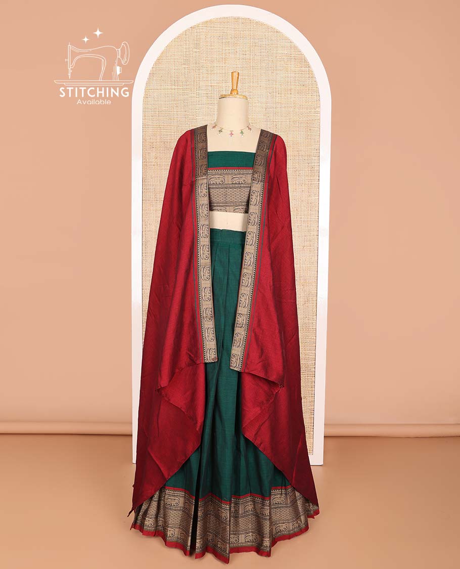 Bottle green cotton half saree with contrast intricate zari design border, zari design blouse & temple, elephant design dhavani