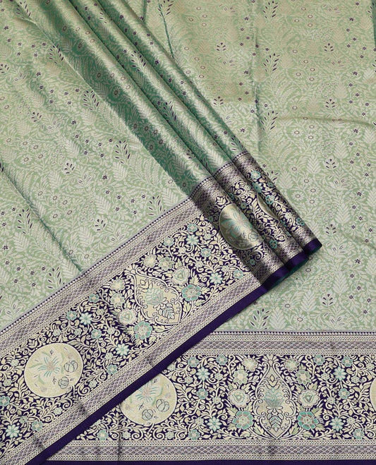 Green Art Silk Half-Saree, Richly Detailed with Jacquard Design, Contrast Intricate Motif Border, Paired with a Contrast Jacquard Blouse, and an Intricate Dhavani