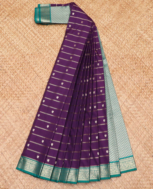 Violet Budget Silk Saree Detailed with Zari Stripes and Peacock Buttas, Complemented by a Contrast Border of Traditional Zari Designs, Subtly Jaal Design Pallu, and Paired with a Contrast Blouse