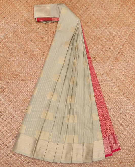 Pale Green Budget Silk Saree, Subtly Adorned with Zari Buttas and Stripes All Over Its Body, Highlighted by Traditional Zari Border, Contrast Grand Jaal Pallu and Paired with a Contrast Blouse
