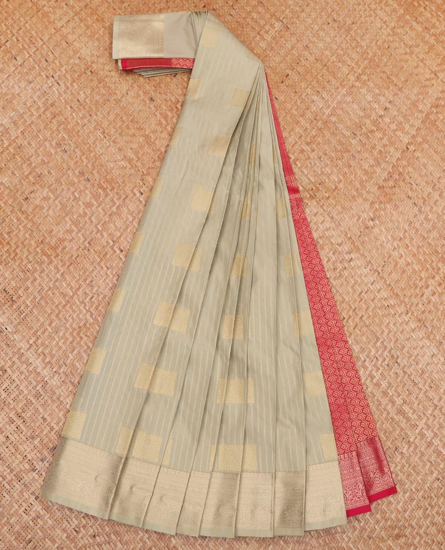 Pale Green Budget Silk Saree, Subtly Adorned with Zari Buttas and Stripes All Over Its Body, Highlighted by Traditional Zari Border, Contrast Grand Jaal Pallu and Paired with a Contrast Blouse