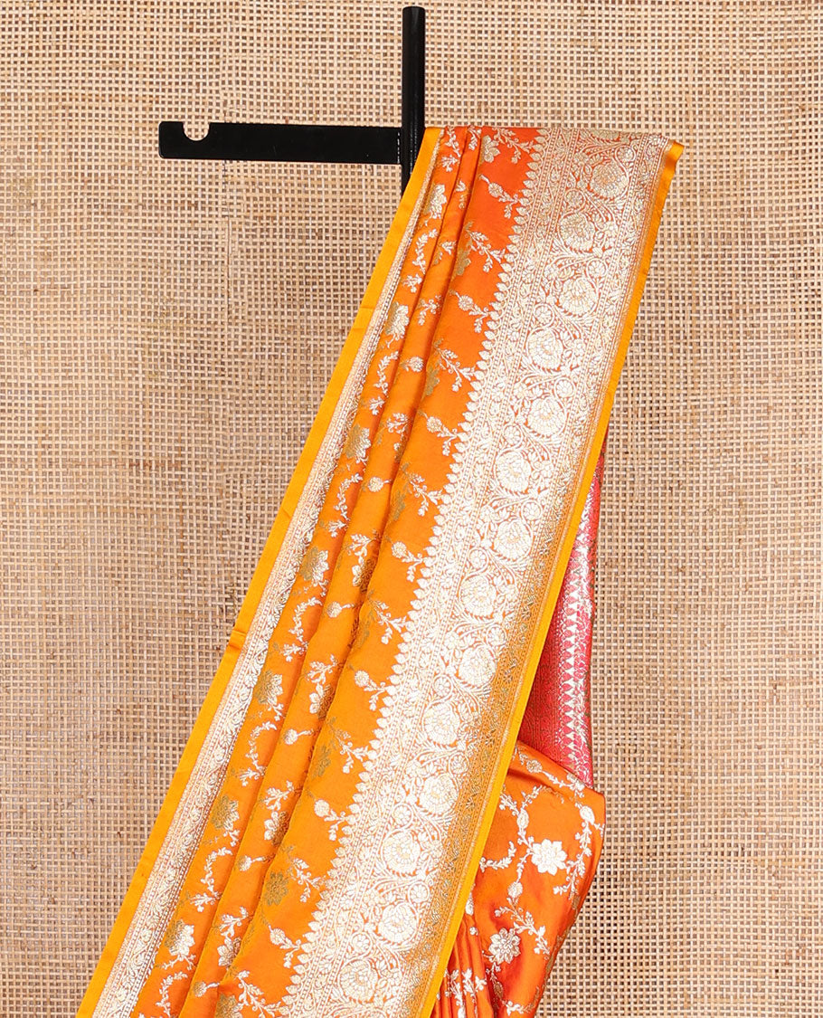 Orange floral jacquard semi banarasi satin, floral creeper zari border & pallu of intricate designs
