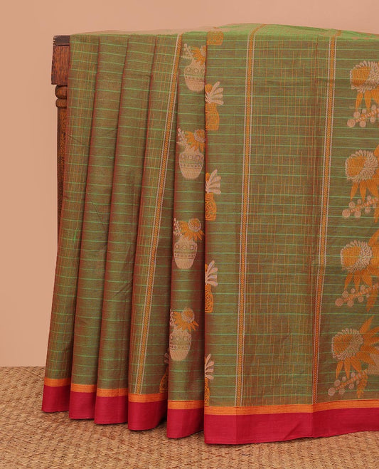 Green stripes, and floral pot motifs Kanchi cotton saree, contrast plain border, and pallu of floral motifs, and geometric patterns