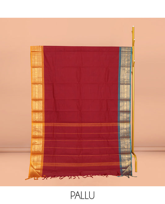 Red Plain Chettinad Cotton Saree, Complemented by a Contrast Traditional Zari Design Woven Ganga-Jamuna Border, Pallu of Stripes, and Paired with a Matching Blouse